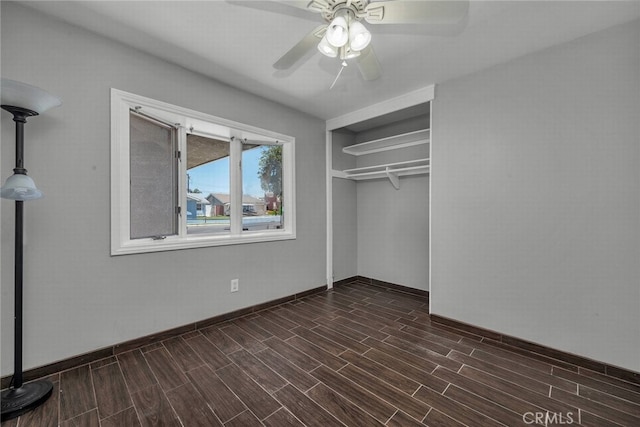 1729 Amelia Ave, San Pedro, CA 90731 - unfurnished bedroom with dark wood-style floors, a closet, a ceiling fan, and baseboards