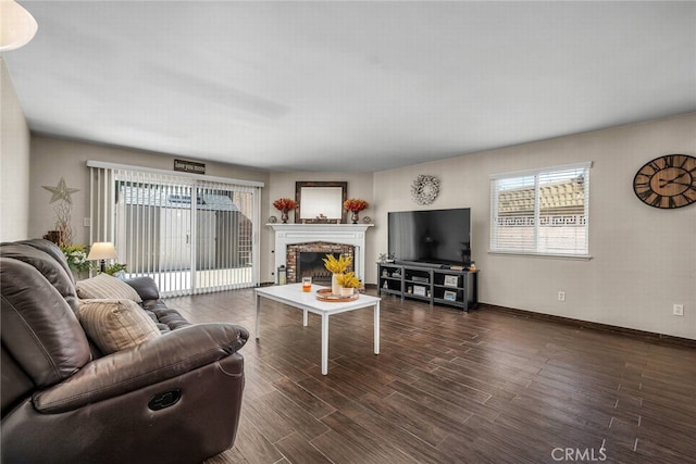 1729 Amelia Ave, San Pedro, CA 90731 - living room featuring a fireplace, wood finished floors, and baseboards