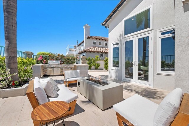 28 Brownsbury Rd, Laguna Niguel, CA 92677 - view of patio with french doors, area for grilling, and an outdoor living space with a fire pit