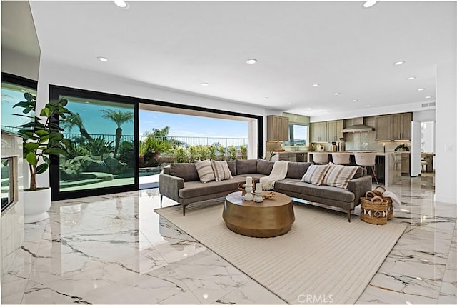 28 Brownsbury Rd, Laguna Niguel, CA 92677 - living room featuring light marble finish flooring and recessed lighting