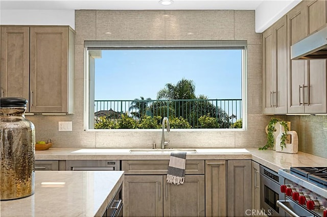 28 Brownsbury Rd, Laguna Niguel, CA 92677 - kitchen with a sink, plenty of natural light, and decorative backsplash