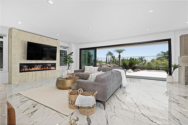 28 Brownsbury Rd, Laguna Niguel, CA 92677 - living area featuring a fireplace, recessed lighting, and marble tiled flooring