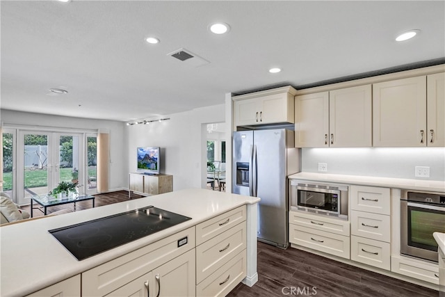 2146 Via Aguila, San Clemente, CA 92673 - kitchen featuring stainless steel appliances, light countertops, recessed lighting, dark wood-style floors, and open floor plan