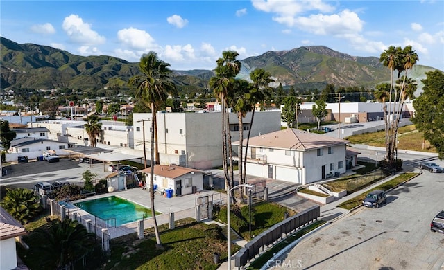 2004 Palm Ave, Highland, CA 92346 - aerial view of residential area featuring a mountainous background and a pool area