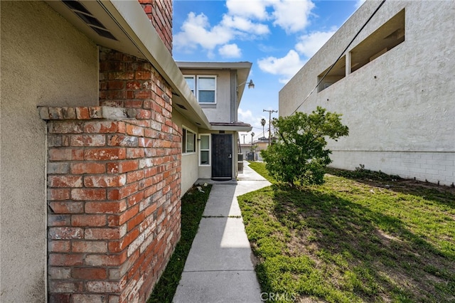 2004 Palm Ave, Highland, CA 92346 - view of home's exterior with stucco siding