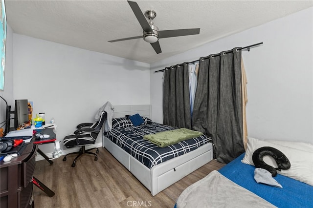 2004 Palm Ave, Highland, CA 92346 - bedroom featuring wood finished floors, ceiling fan, and a textured ceiling