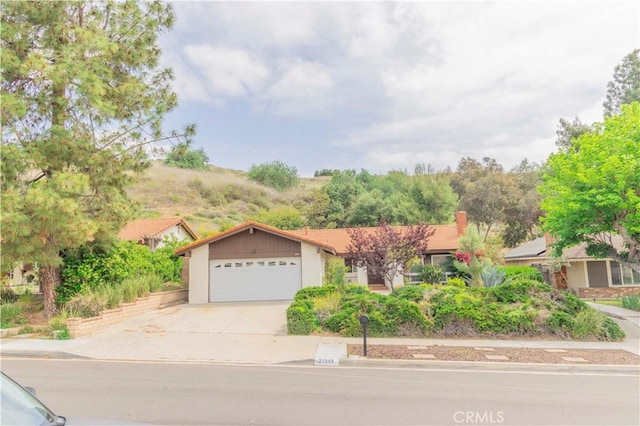 21049 Silver Cloud Dr, Diamond Bar, CA 91765 - view of front of home featuring driveway and a garage