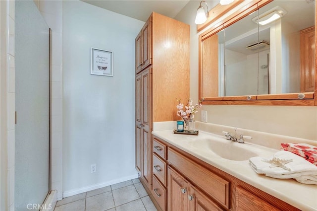 6119 Eastbrook Ave, Lakewood, CA 90713 - bathroom featuring vanity, a shower stall, tile patterned flooring, and baseboards