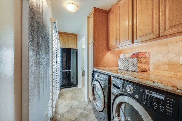 6119 Eastbrook Ave, Lakewood, CA 90713 - washroom with washer and dryer and light tile patterned floors