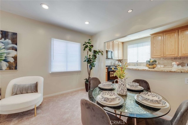 6119 Eastbrook Ave, Lakewood, CA 90713 - dining space featuring light carpet, recessed lighting, and baseboards
