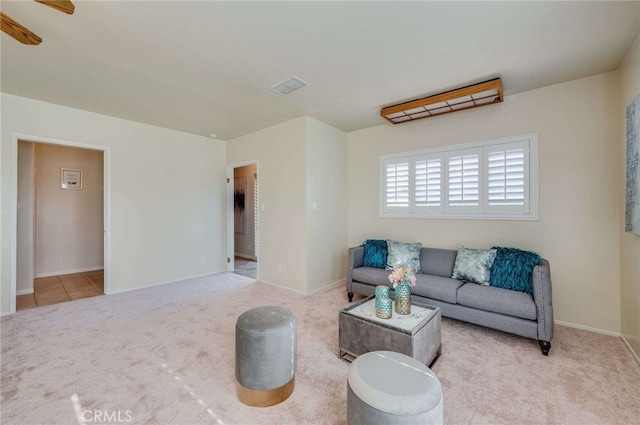 6119 Eastbrook Ave, Lakewood, CA 90713 - carpeted living room with baseboards and a ceiling fan