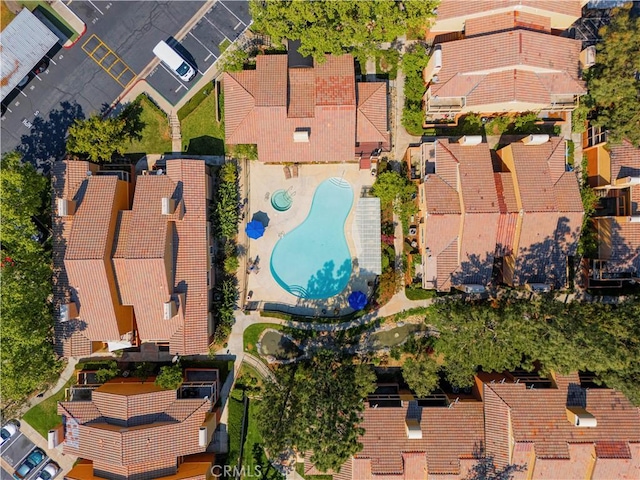 drone / aerial view of a pool