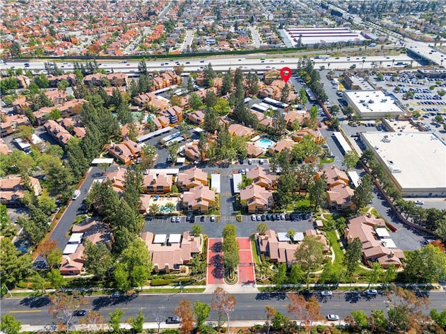 aerial overview of property's location with nearby suburban area