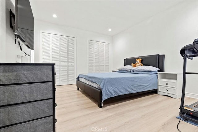 bedroom with light wood-type flooring and recessed lighting