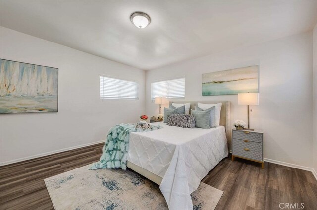 5642 Briercrest Ave, Lakewood, CA 90713 - bedroom with wood finished floors and baseboards