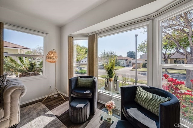 5642 Briercrest Ave, Lakewood, CA 90713 - living area with wood finished floors and baseboards