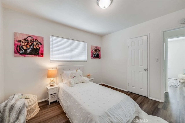 5642 Briercrest Ave, Lakewood, CA 90713 - bedroom featuring baseboards and wood finished floors