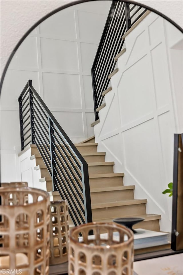 17 Candlewood, Irvine, CA 92620 - stairs featuring a decorative wall