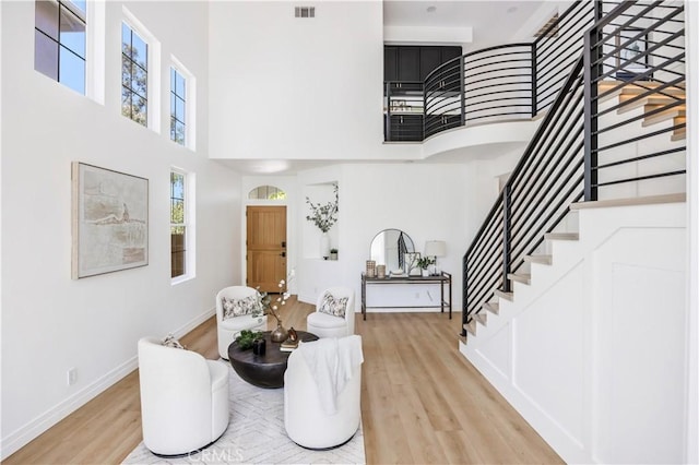 17 Candlewood, Irvine, CA 92620 - dining room with a high ceiling, wood finished floors, stairs, and baseboards