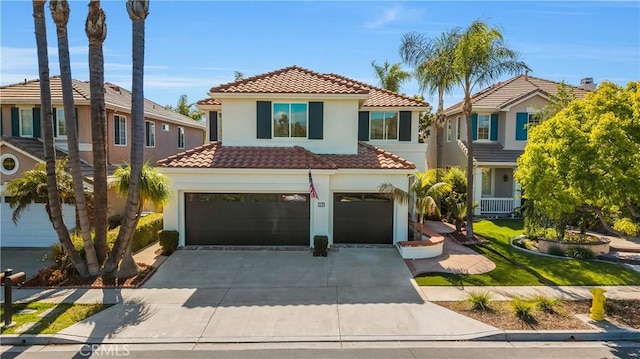 17 Candlewood, Irvine, CA 92620 - view of front of property with a tiled roof, a garage, stucco siding, and driveway