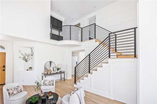 17 Candlewood, Irvine, CA 92620 - staircase with wood finished floors and a towering ceiling