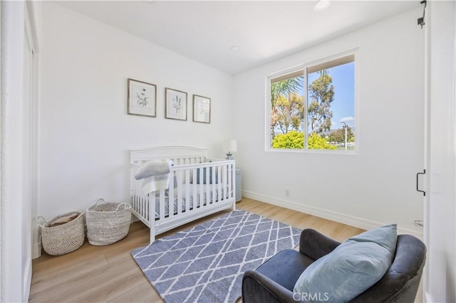 17 Candlewood, Irvine, CA 92620 - bedroom featuring wood finished floors, baseboards, and recessed lighting