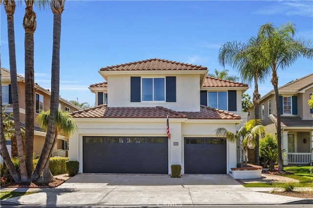 17 Candlewood, Irvine, CA 92620 - view of front of property featuring a tile roof, an attached garage, driveway, and stucco siding