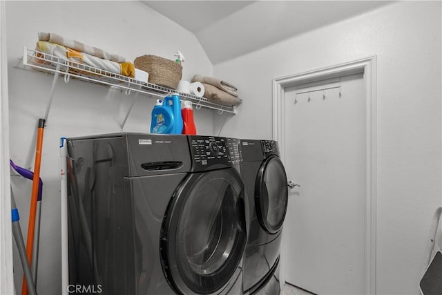 laundry area with washing machine and dryer