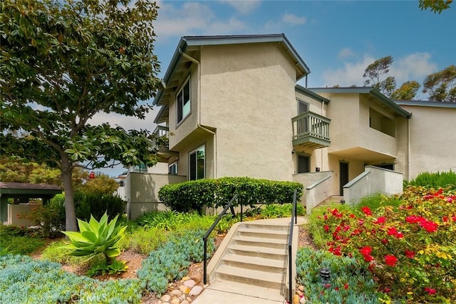 view of building exterior featuring stairway
