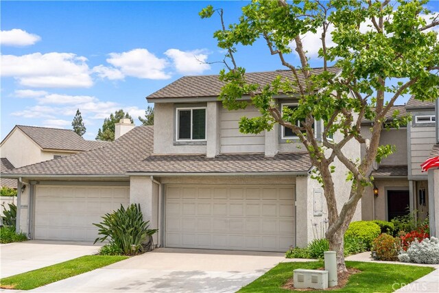 206 Eisenhower, Placentia, CA 92870 - view of front of property with stucco siding, driveway, and a chimney