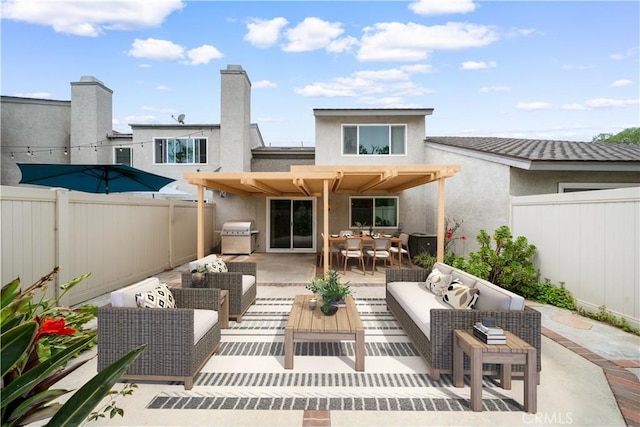 206 Eisenhower, Placentia, CA 92870 - rear view of property featuring an outdoor hangout area, stucco siding, and a fenced backyard