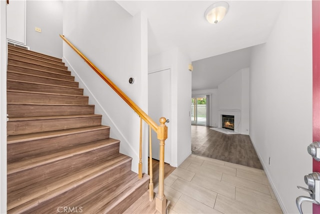 206 Eisenhower, Placentia, CA 92870 - stairs with a fireplace and baseboards