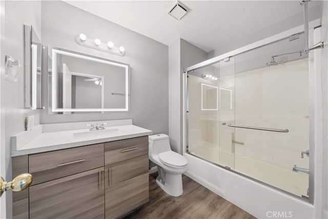 206 Eisenhower, Placentia, CA 92870 - bathroom with toilet, vanity, wood finished floors, and combined bath / shower with glass door
