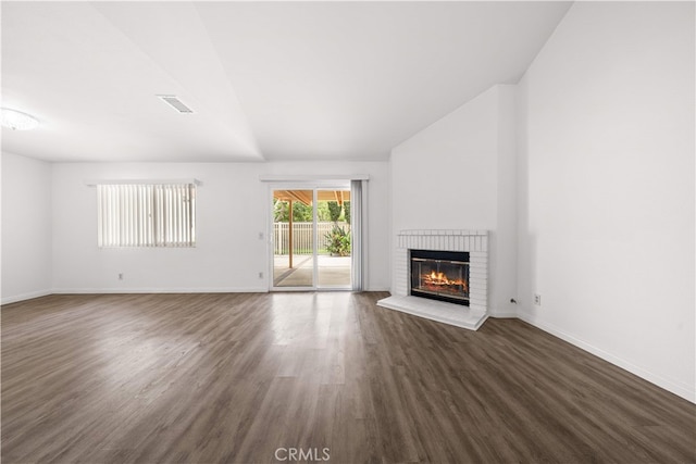 206 Eisenhower, Placentia, CA 92870 - unfurnished living room with dark wood-style flooring, a fireplace, and baseboards