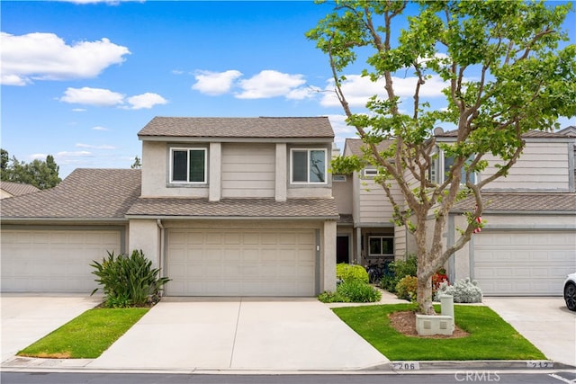 206 Eisenhower, Placentia, CA 92870 - view of front of property with stucco siding and concrete driveway