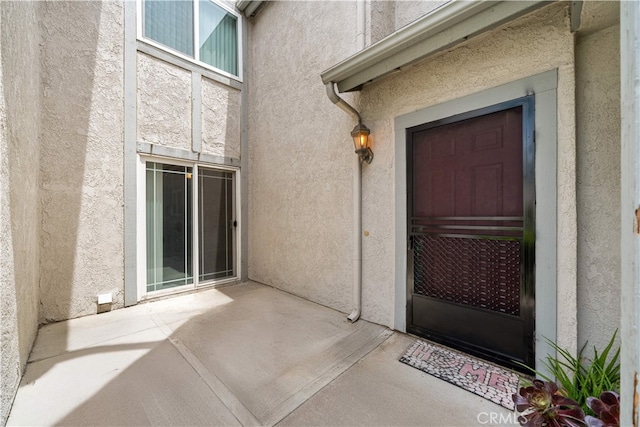 206 Eisenhower, Placentia, CA 92870 - entrance to property featuring stucco siding and a patio