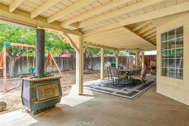 view of patio / terrace featuring outdoor dining space and a fenced backyard