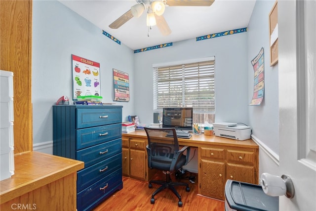 office with ceiling fan and light wood-type flooring