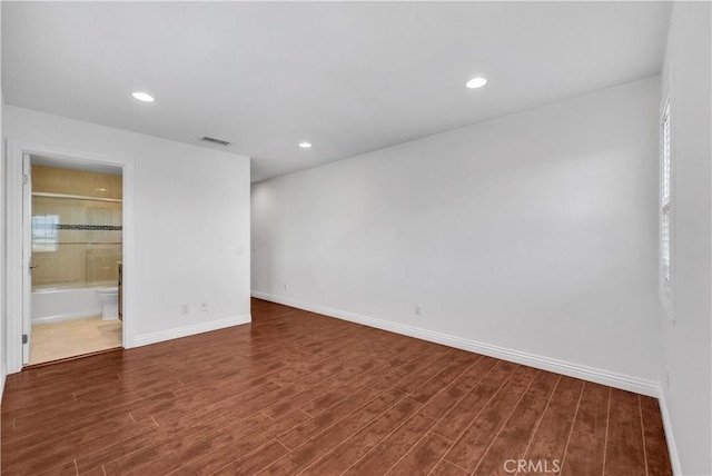9588 Shimizu River Cir, Fountain Valley, CA 92708 - unfurnished room with dark wood-type flooring, baseboards, and recessed lighting