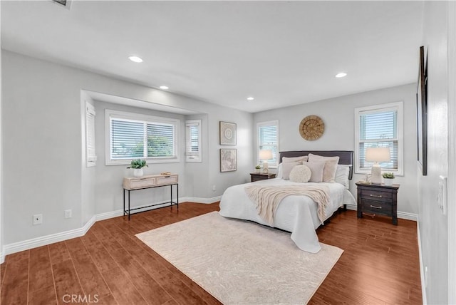 9588 Shimizu River Cir, Fountain Valley, CA 92708 - bedroom with multiple windows, dark wood-style floors, recessed lighting, and baseboards