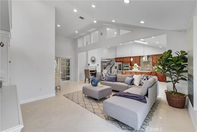 9588 Shimizu River Cir, Fountain Valley, CA 92708 - living room with stairway, recessed lighting, baseboards, and high vaulted ceiling
