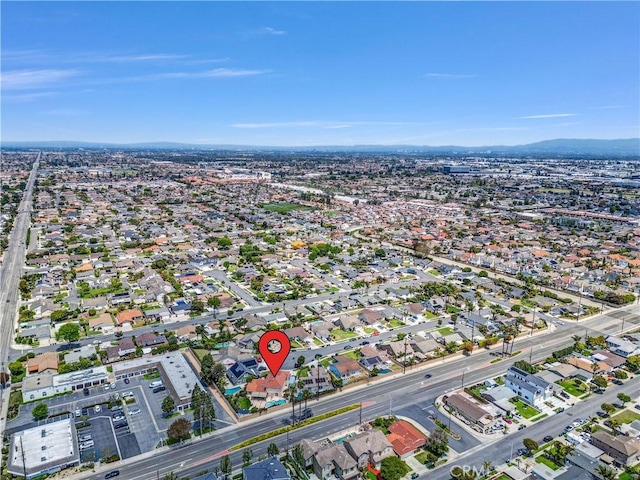 9588 Shimizu River Cir, Fountain Valley, CA 92708 - aerial view of property and surrounding area with nearby suburban area and a mountainous background