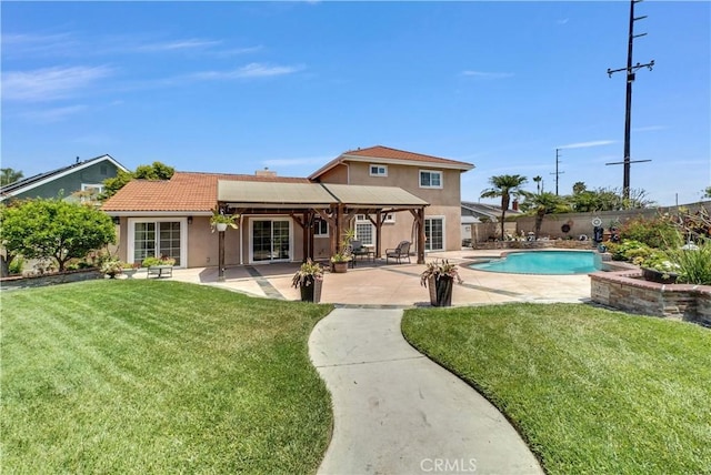 9588 Shimizu River Cir, Fountain Valley, CA 92708 - rear view of property featuring stucco siding, a patio area, and a tile roof