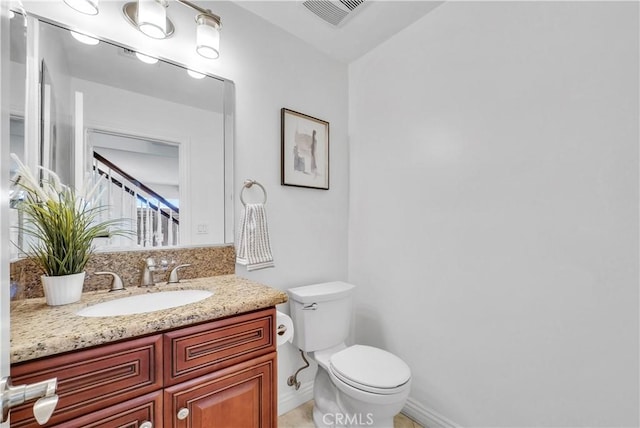 9588 Shimizu River Cir, Fountain Valley, CA 92708 - bathroom with toilet, vanity, and baseboards