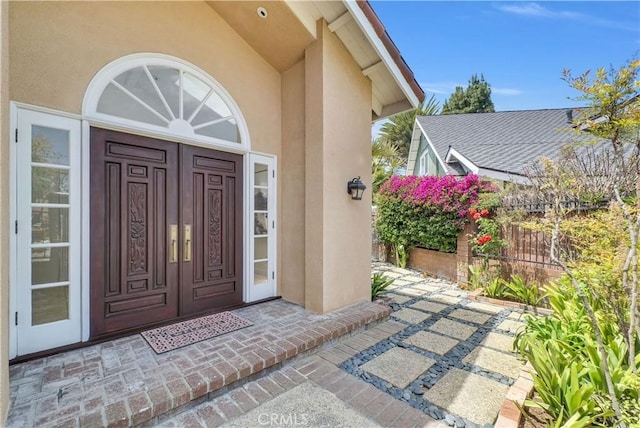 9588 Shimizu River Cir, Fountain Valley, CA 92708 - property entrance featuring stucco siding and fence