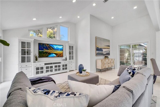 9588 Shimizu River Cir, Fountain Valley, CA 92708 - living area with carpet, recessed lighting, high vaulted ceiling, and baseboards