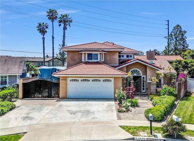 9588 Shimizu River Cir, Fountain Valley, CA 92708 - mediterranean / spanish house with stucco siding, a tile roof, a gate, driveway, and a garage