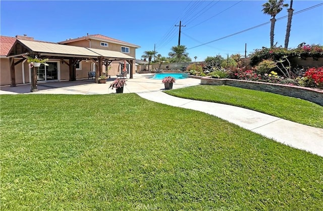 9588 Shimizu River Cir, Fountain Valley, CA 92708 - view of grassy yard featuring a patio, an outdoor pool, and a gazebo