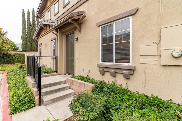 22326 Blue Lupine Cir, Grand Terrace, CA 92313 - view of exterior entry with stucco siding