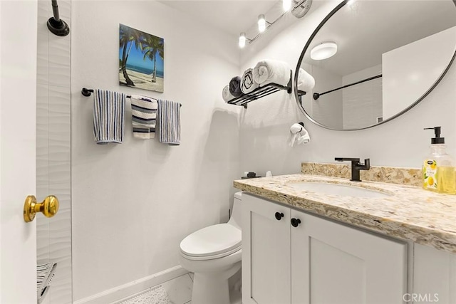 11165 Affinity Ct Unit 32, San Diego, CA 92131 - bathroom with toilet, vanity, baseboards, and a shower